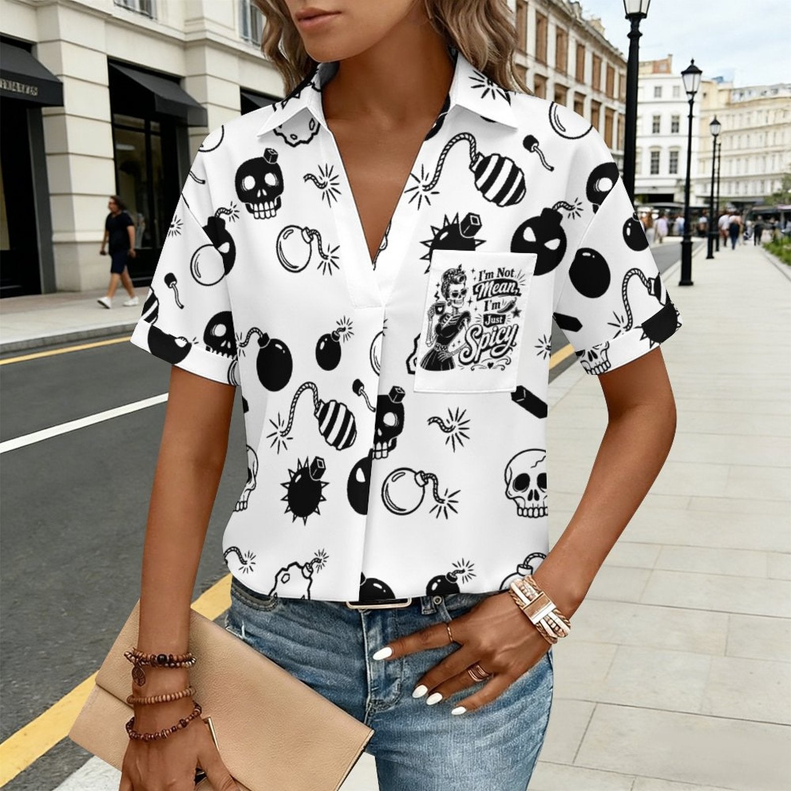 ront lifestyle view mockup of a woman wearing a white loose-fit boat neck t-shirt featuring a highly detailed graphic layout with a skull and text that reads I'm Not Mean I'm Spicy.
