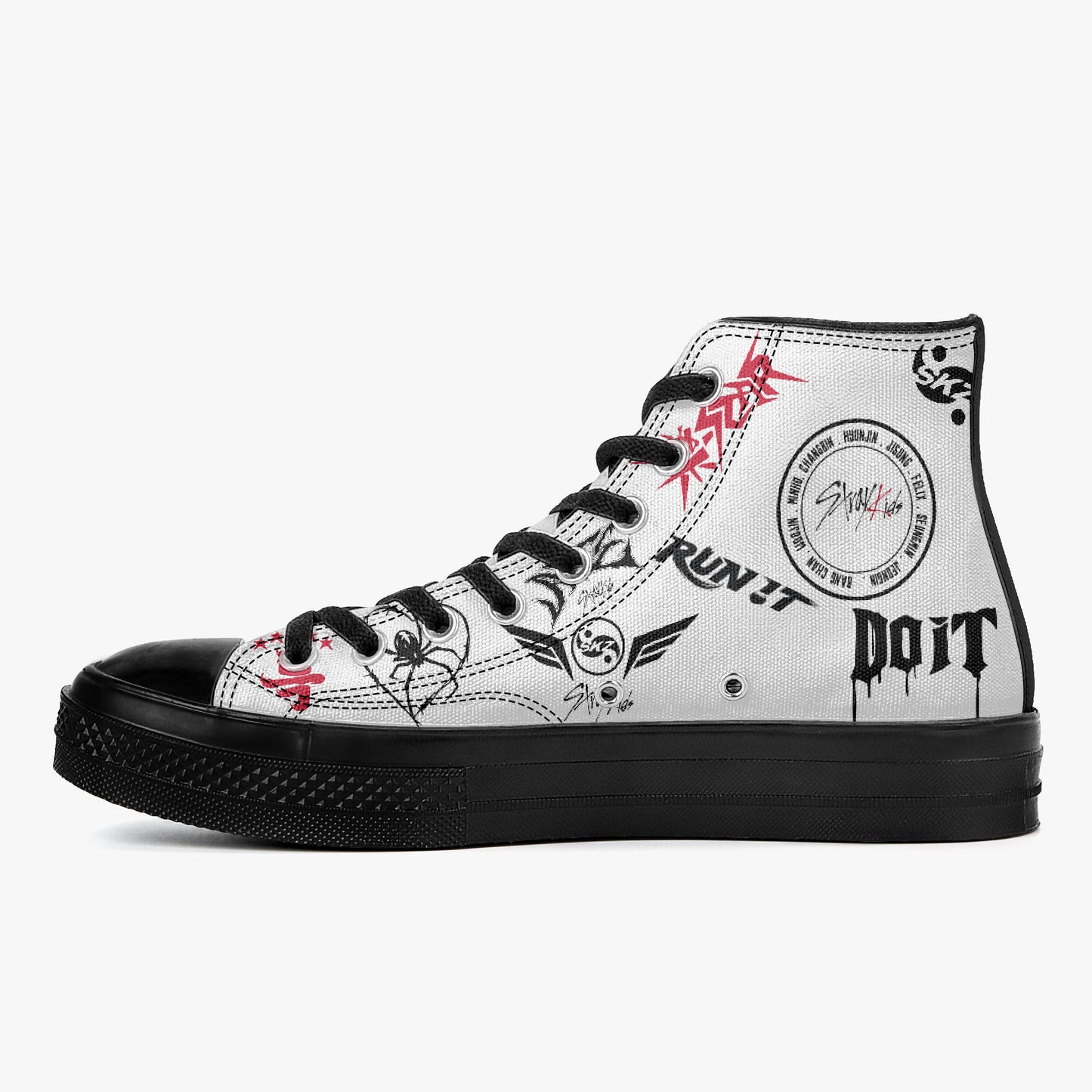 Close-up side profile view of a custom Stray Kids white canvas high-top sneaker on a white background, highlighting a sharp black rubber outsole and a packed layout of red and black graffiti k-pop fandom graphics, including member names like "CHANGBIN", "HYUNJIN", and "HAN" written in a circular motif around a central logo.