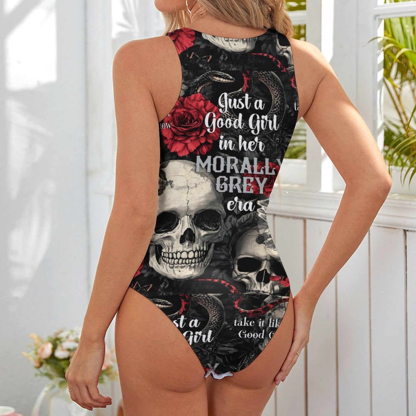 Model styled in a Dark Romance aesthetic bodysuit, perfect for Dark Academia and bookish outfits.