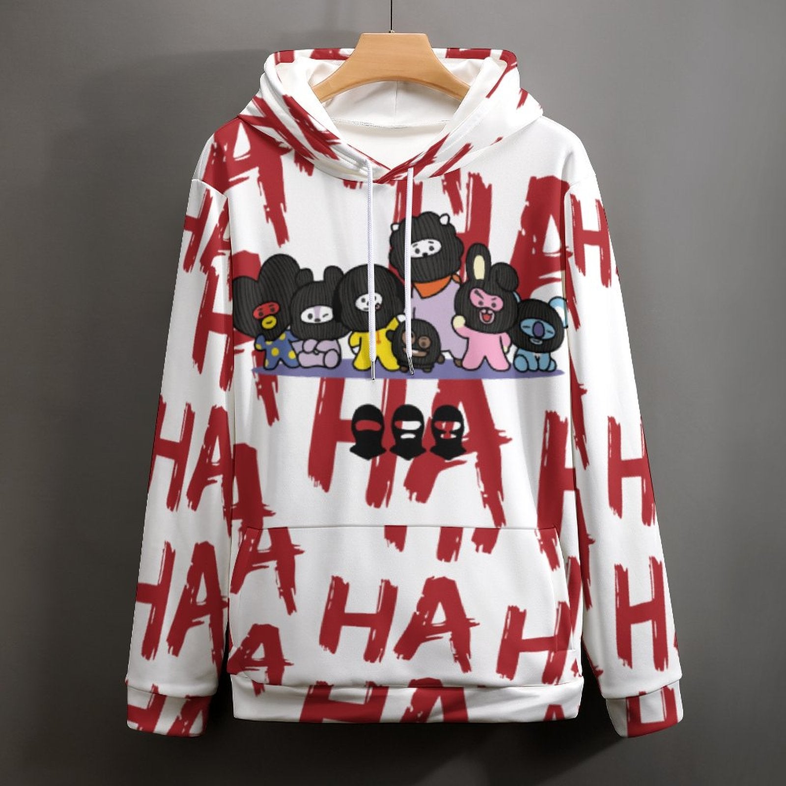 White all-over print graphic hoodie with red HA HA HA text and cartoon character design, showcasing an oversized K-pop concert outfit style.
