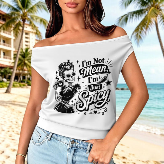 A front view of a white women's asymmetrical single shoulder t-shirt featuring an edgy 'Not Mean I'm Spicy' slogan text graphic design.