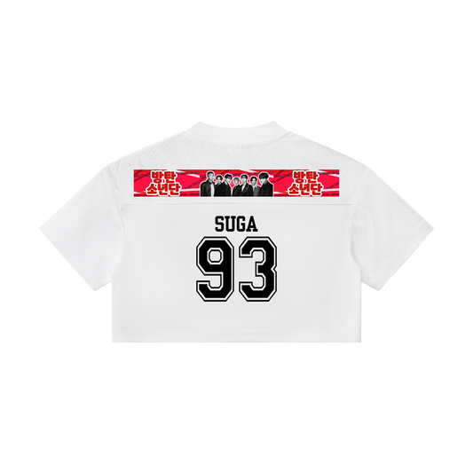 Front view of the white BTS Jungkook  Suga cropped paneled v-neck jersey, showcasing a custom red Whalien 52 whale graphic flanked by the black BTS and ARMY logos.