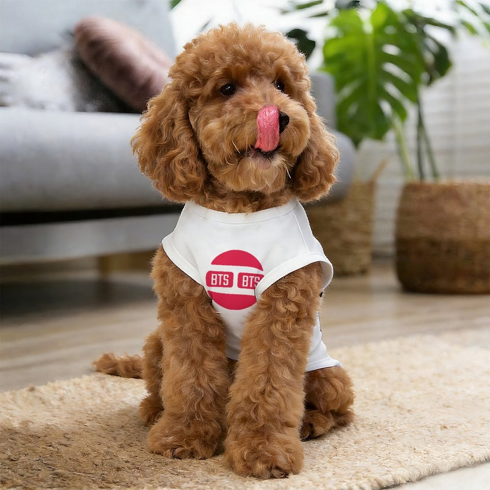 Close-up detail of 'BTS Hooligan' red circle logo on a white ice silk dog shirt, showing high-quality sublimation printing.