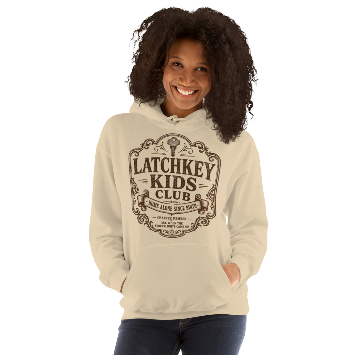 Female model wearing Latchkey Kids Club vintage graphic hoodie paired with denim jeans