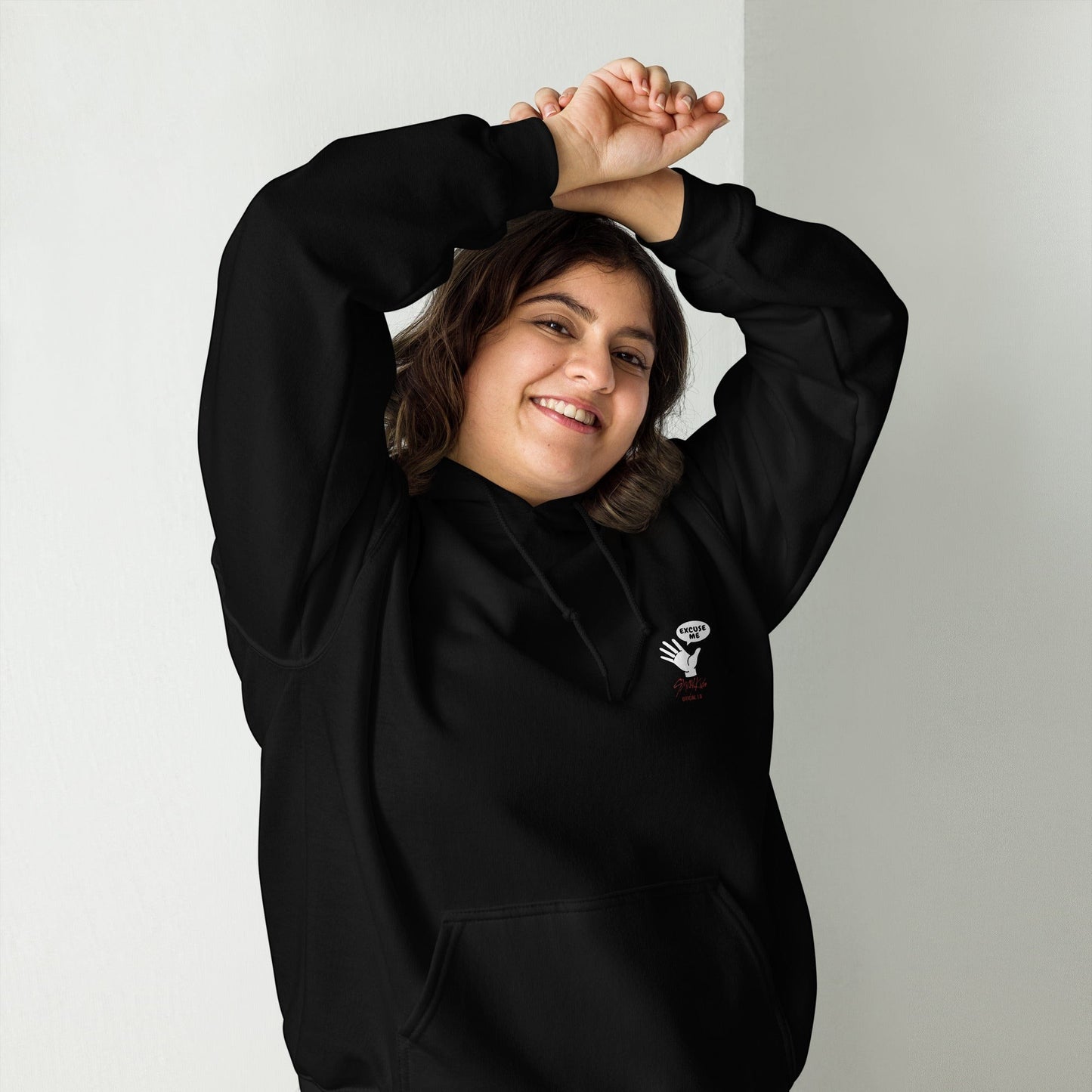 Clothing By Hot Takes Designs black unisex hoodie with a small graphic of a hand and speech bubble on the chest