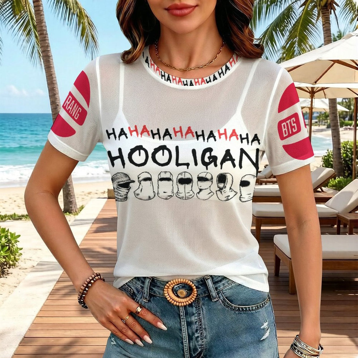 Clothing By Hot Takes Designs white sheer mesh BTS Hooligan graphic t-shirt worn by a woman on a sunny beach.