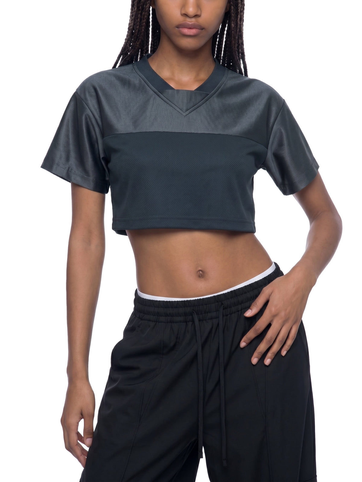 Clothing By Hot Takes Designs dark grey cropped V-neck jersey with paneled detailing worn by a model.