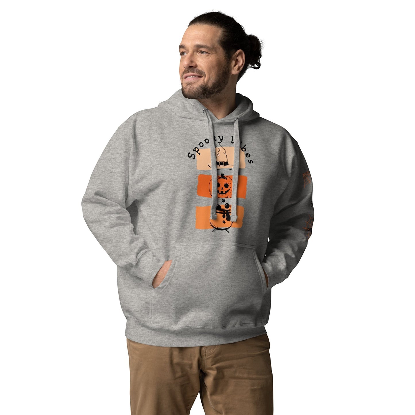 Clothing By Hot Takes Designs grey fleece-lined hoodie with a retro Spooky Vibes pumpkin graphic on a male model