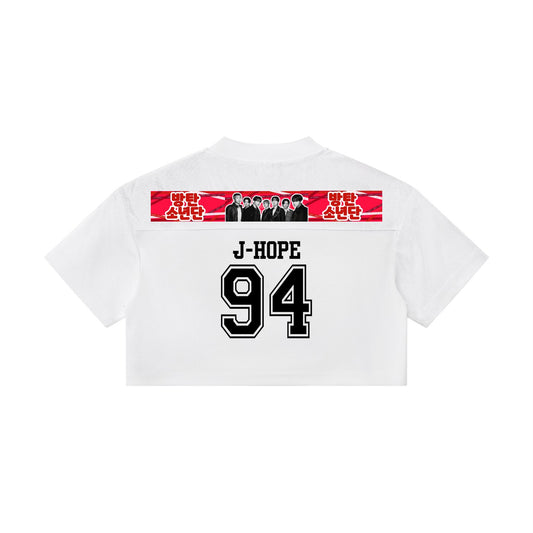 Clothing By Hot Takes Designs white cropped jersey featuring J-Hope 94 branding and a BTS graphic front panel.