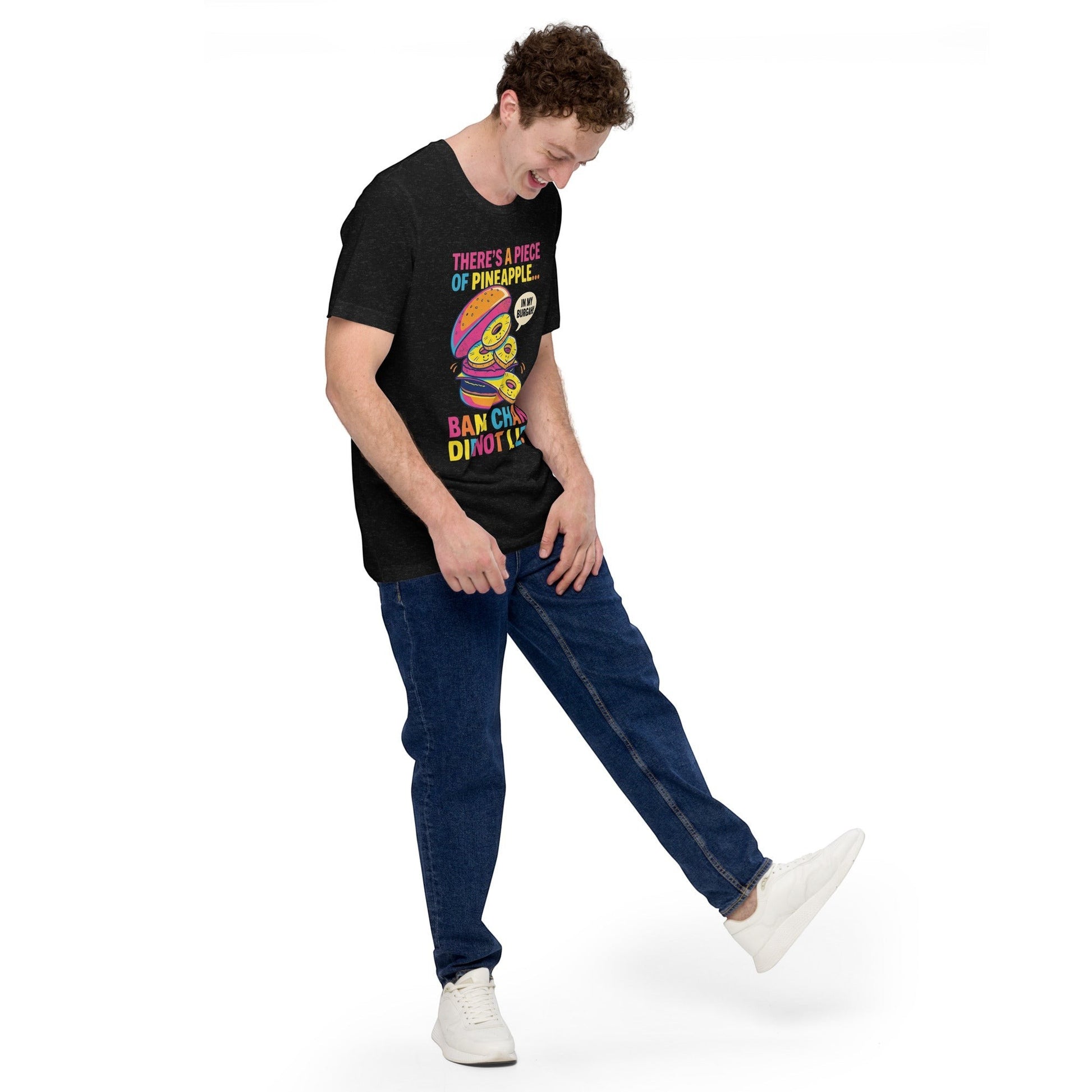 Clothing By Hot Takes Designs black heather graphic t-shirt featuring a pineapple burger meme worn by a man.