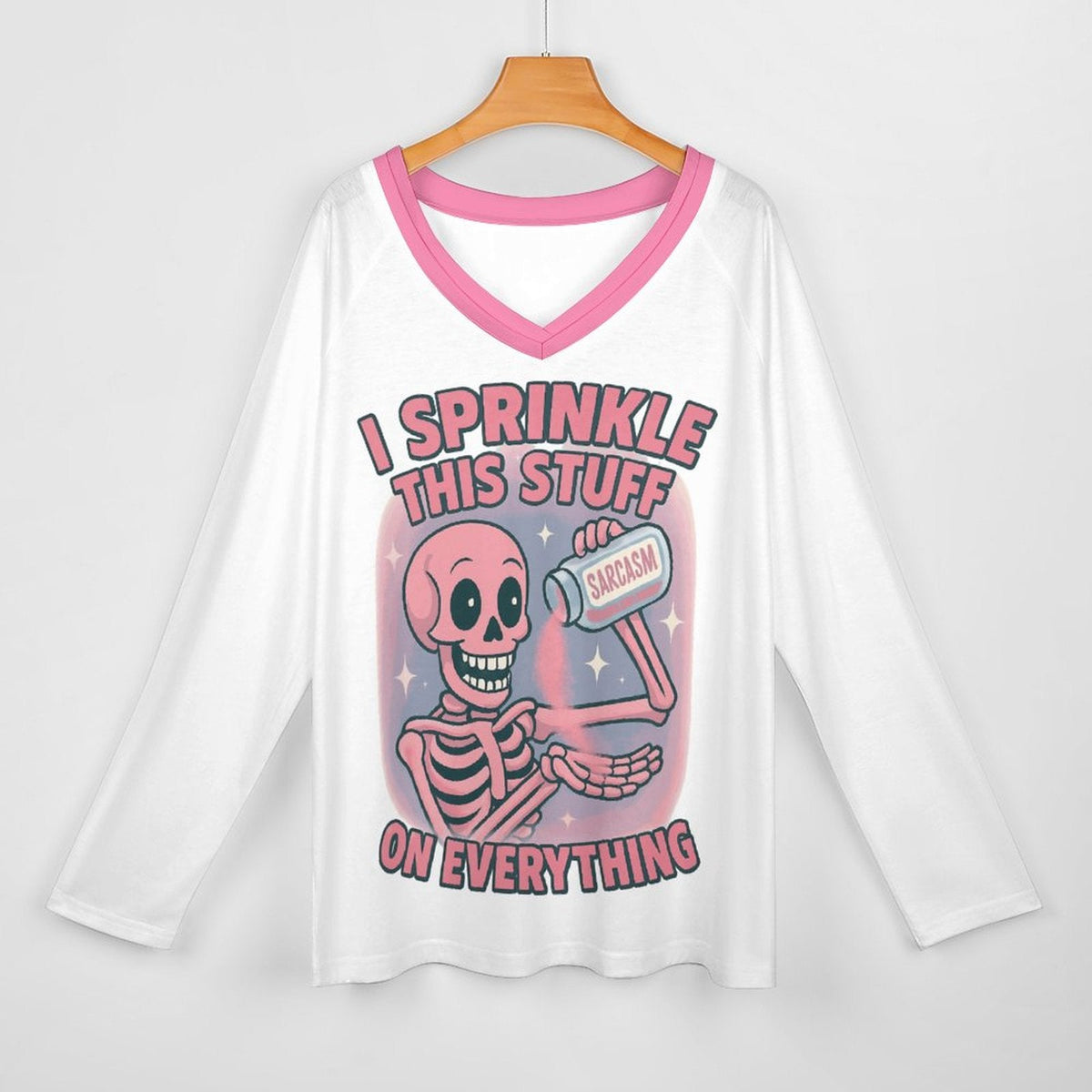 Clothing By Hot Takes Designs white long sleeve V-neck tee with a pink skeleton graphic and sarcastic text print.