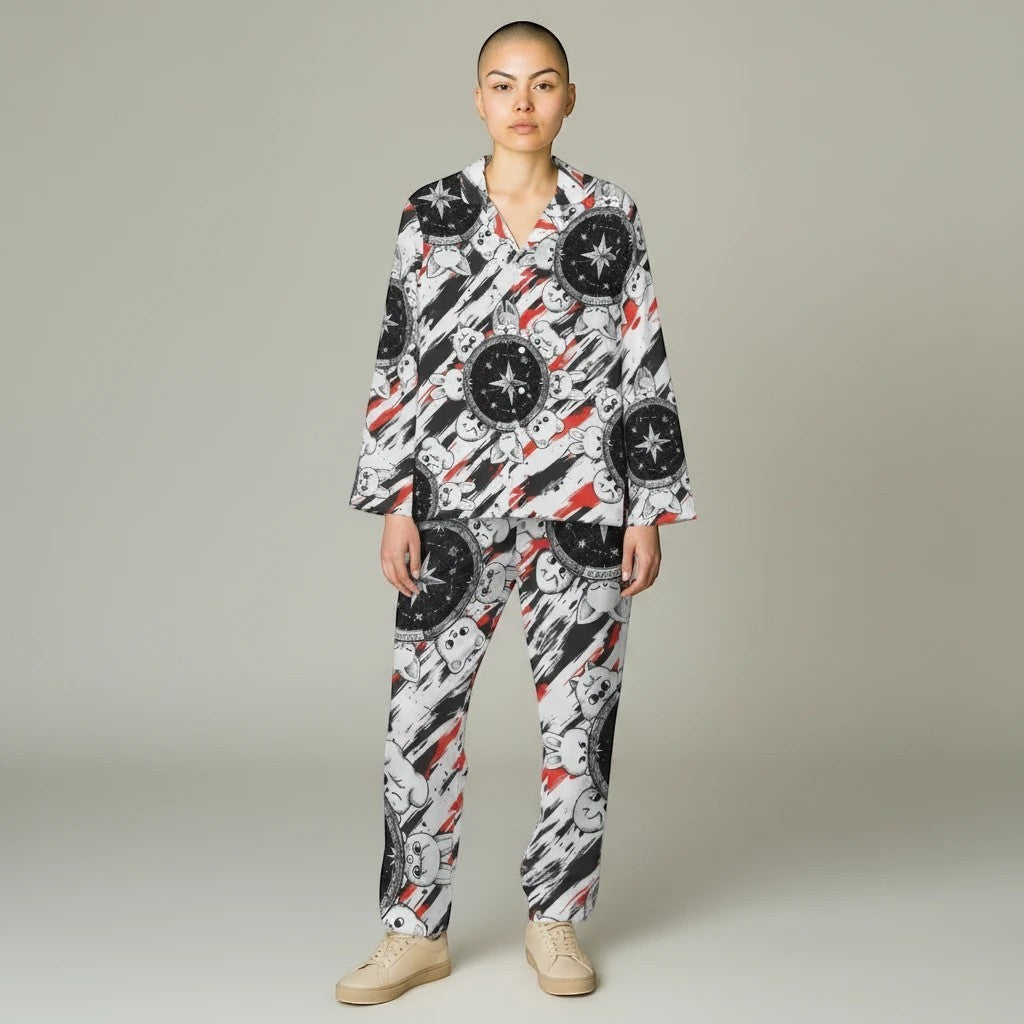 Clothing By Hot Takes Designs Stray Kids SKZOO pajama set with black, white, and red graphic print on a model.