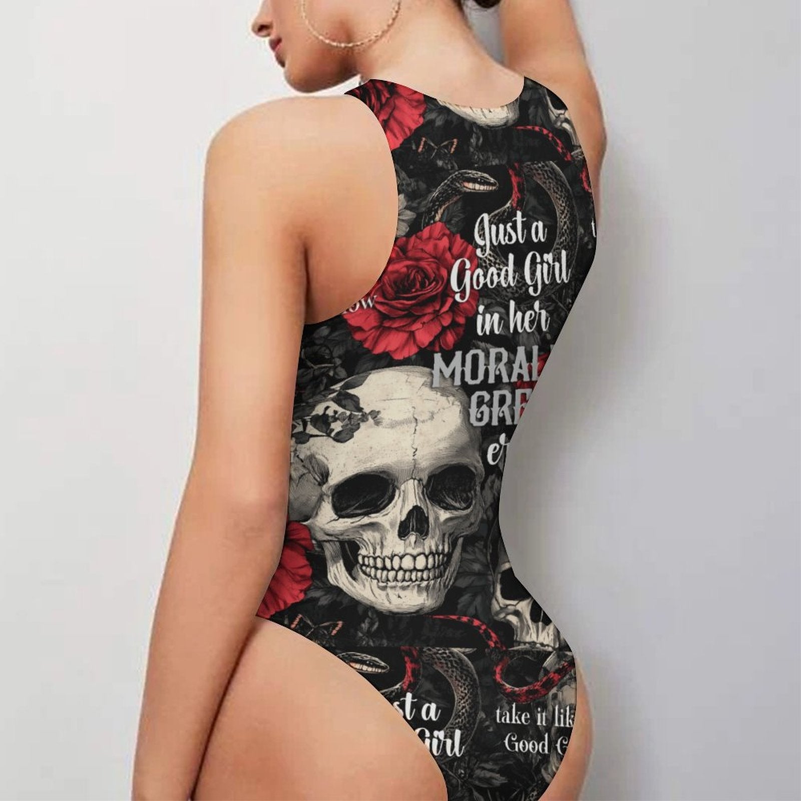 Morally Grey Era' black sleeveless bodysuit with gothic skull and rose design.