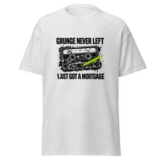 Ash gray unisex t-shirt featuring a distressed 90s cassette tape graphic and the text "Grunge Never Left I Just Got a Mortgage"