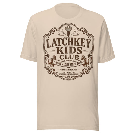 Front view of Latchkey Kids Club retro graphic t-shirt in soft cream color.