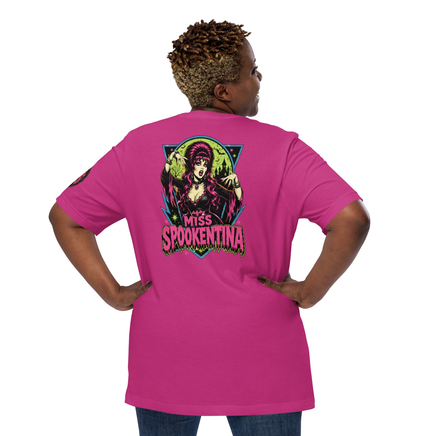 Back view of female model wearing a berry pink unisex graphic t-shirt with Miss Spookentina cauldron graphic