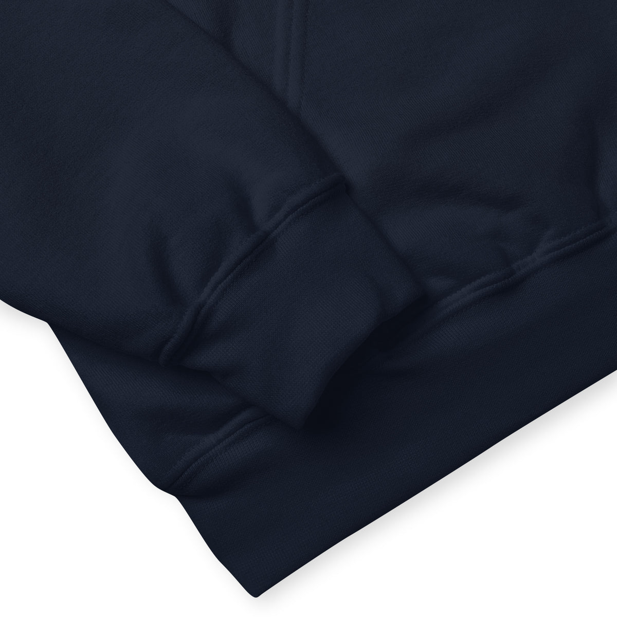 Close-up side view of a folded navy blue hoodie highlighting the soft fabric texture and fleece interior