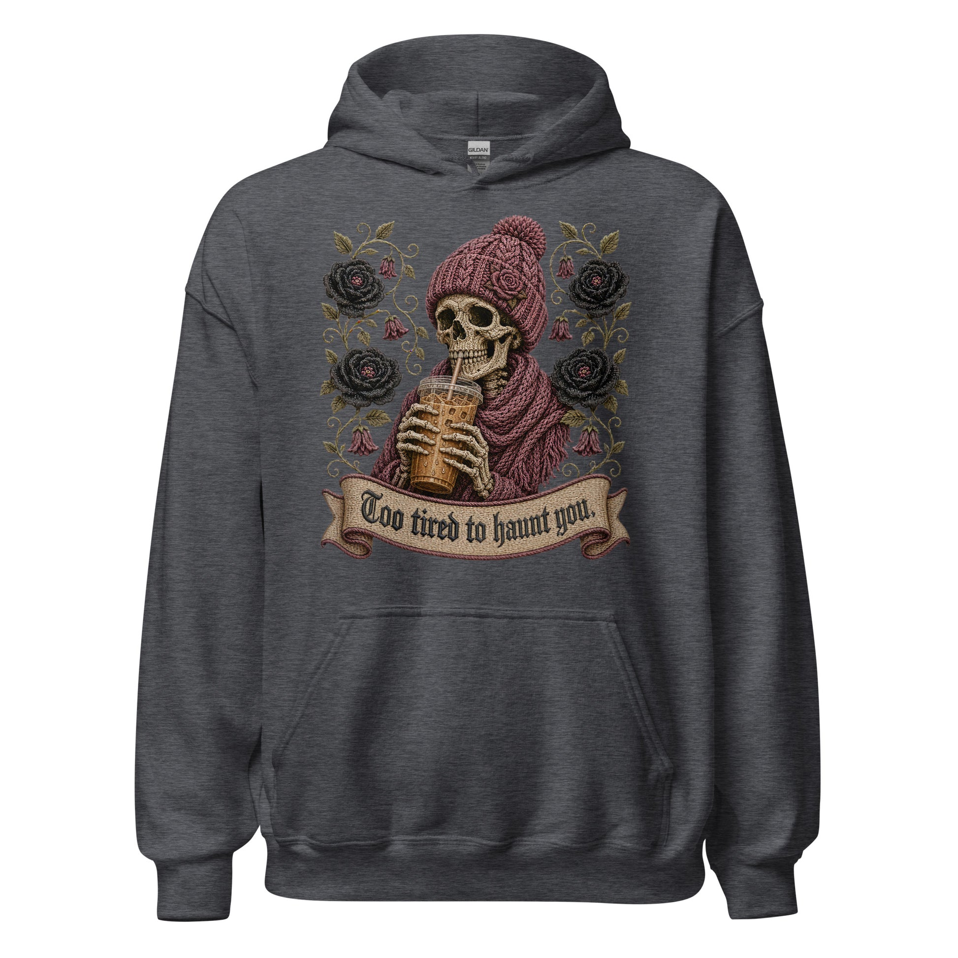 Dark heather gray unisex pullover hoodie mockup featuring a gothic skeleton wearing a knit beanie drinking iced coffee with dark roses and banner reading Too Tired to Haunt You