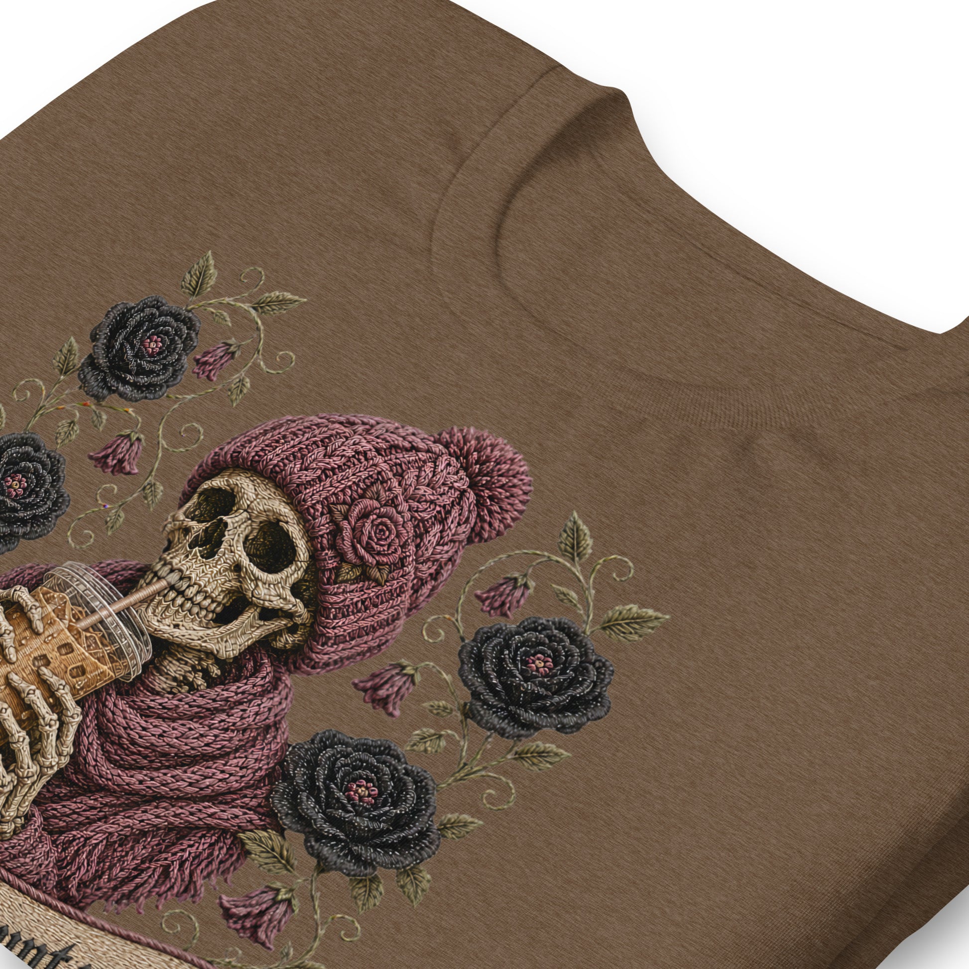 Close-up view of vintage gothic skeleton illustration on heather brown cotton fabric