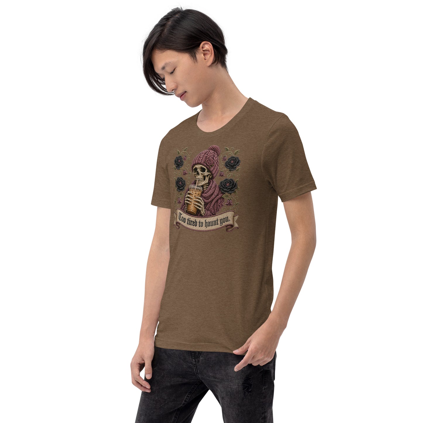 Male model wearing heather brown unisex t-shirt featuring gothic skeleton and iced coffee artwork