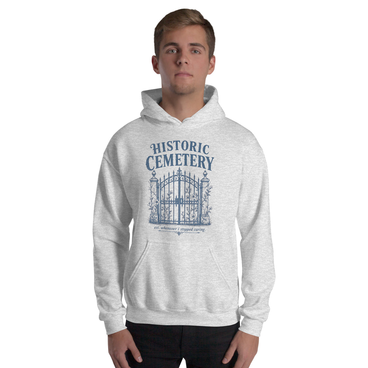 Model wearing oversized vintage gothic cemetery gates hoodie styled for fall dark academia aesthetic.