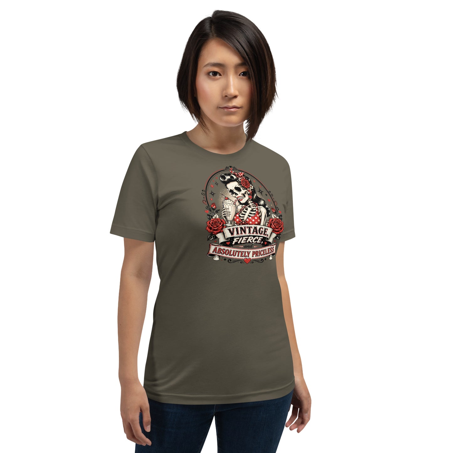 Front view of a female model wearing an army green unisex graphic t-shirt featuring a rockabilly skeleton pinup girl holding a sundae with red roses and banner reading Vintage Fierce and Absolutely Priceless