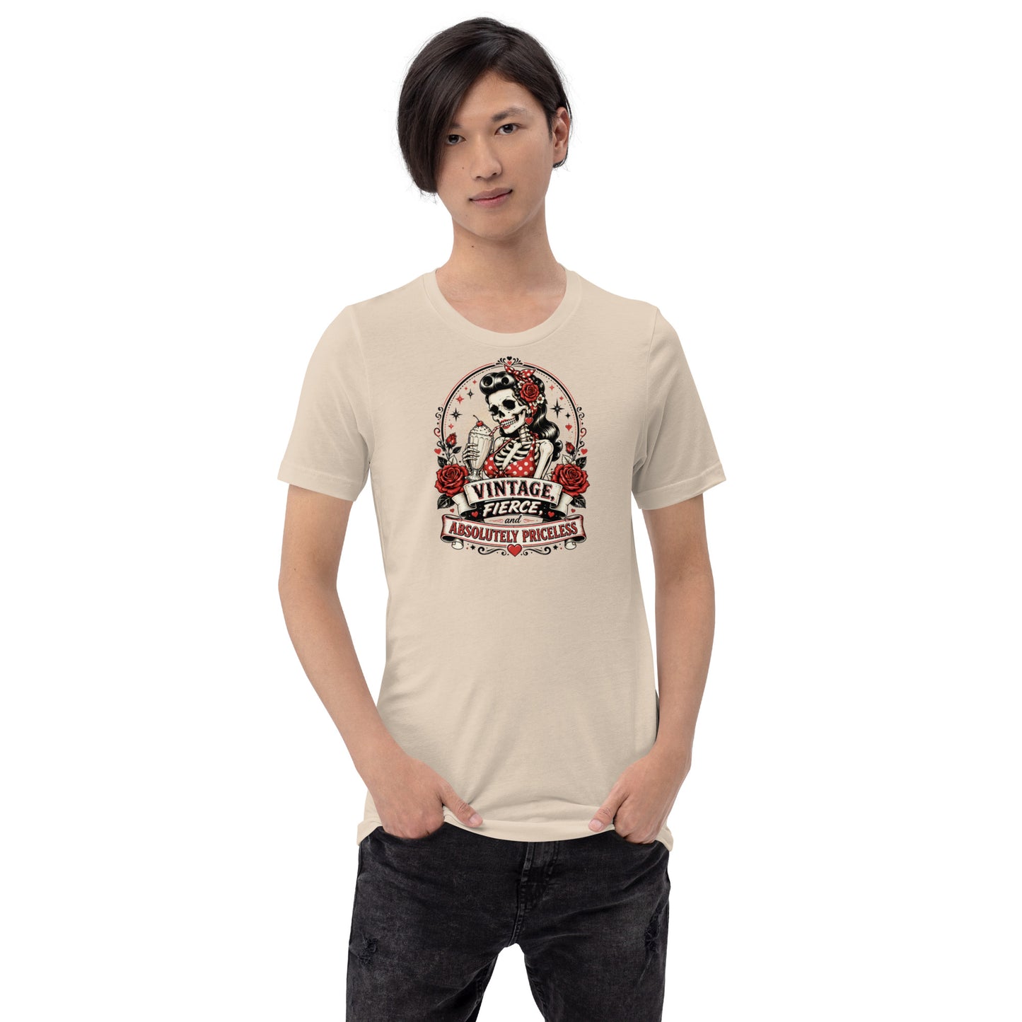 Male model standing wearing a soft cream unisex graphic t-shirt featuring the rockabilly skeleton pinup graphic