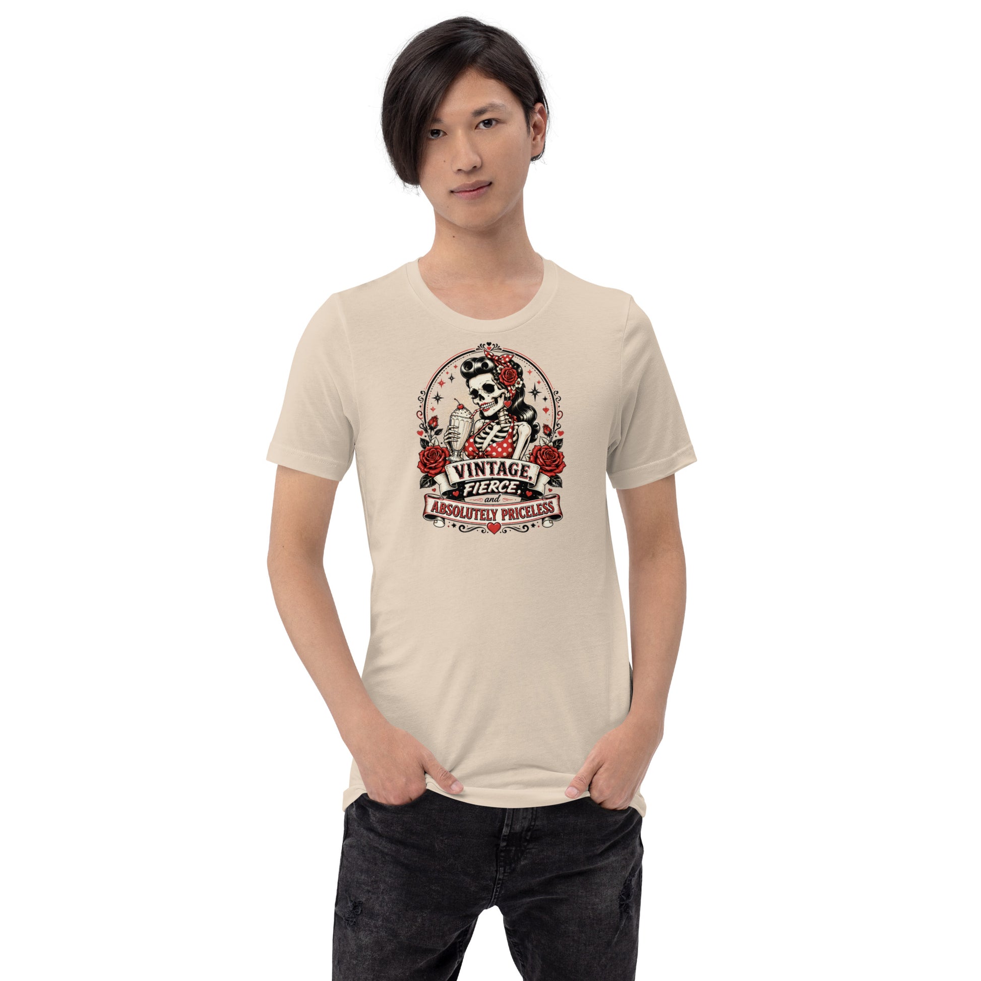 Male model standing wearing a soft cream unisex graphic t-shirt featuring the rockabilly skeleton pinup graphic